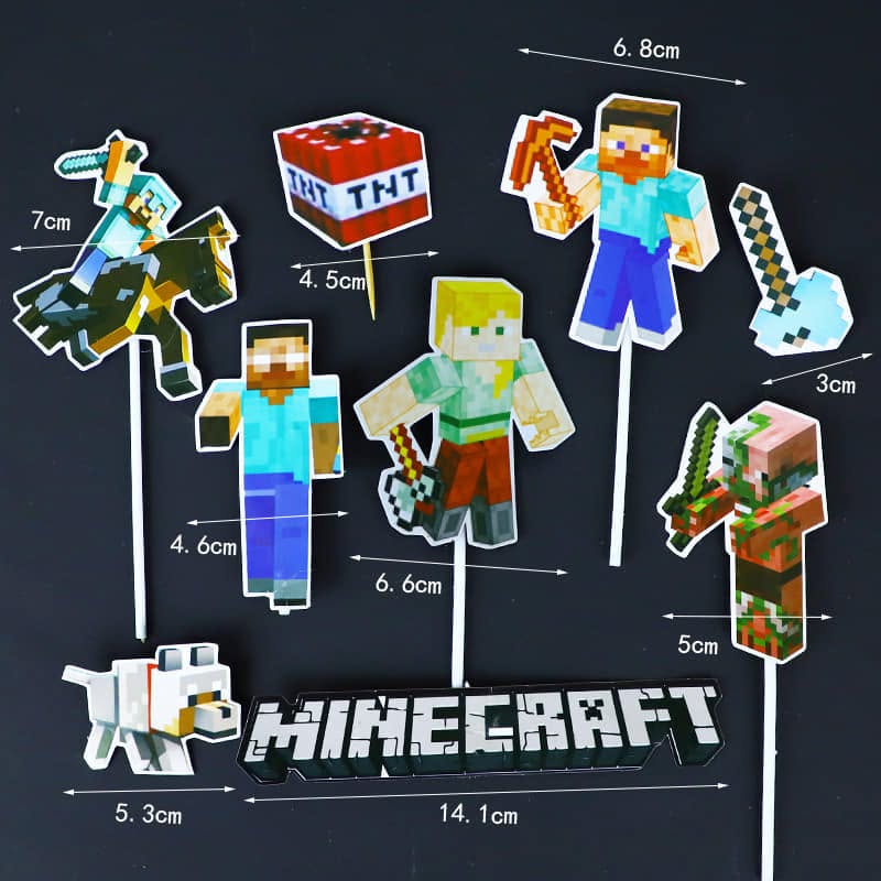 Set of Minecraft-themed cake toppers including character figures and a TNT block